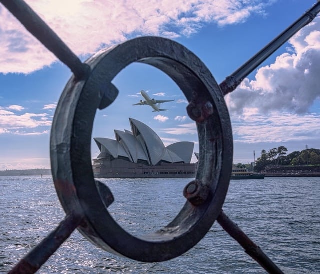 Photography ideas: Sydney opera house across a railing.