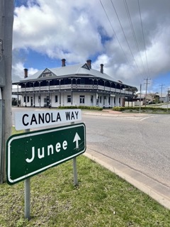sign showing way to Junee via Canola Way