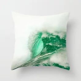 A wave-inspired throw pillow in green for post travel blues.