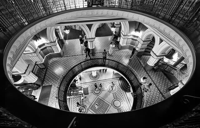 Black and white top down view of an elegantly designed, showcasing a 'frame within a frame' composition in architectural landscape photography.